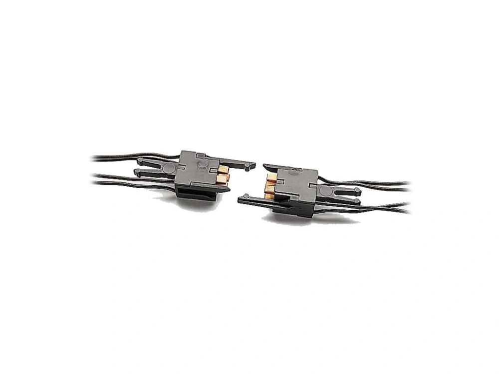 H0 - vodivé, elektricky propojené spřáhlo s 4 póly - pár