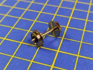 Náhradní díl, dvojkolí, průměr 7,6 mm, osa 18,75 mm, jednostranně izolované, TT, Roco 124472