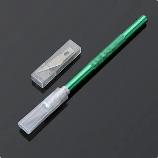 Nůž - skalpel modelářský s vyměnitelnýma planžetama - zelený